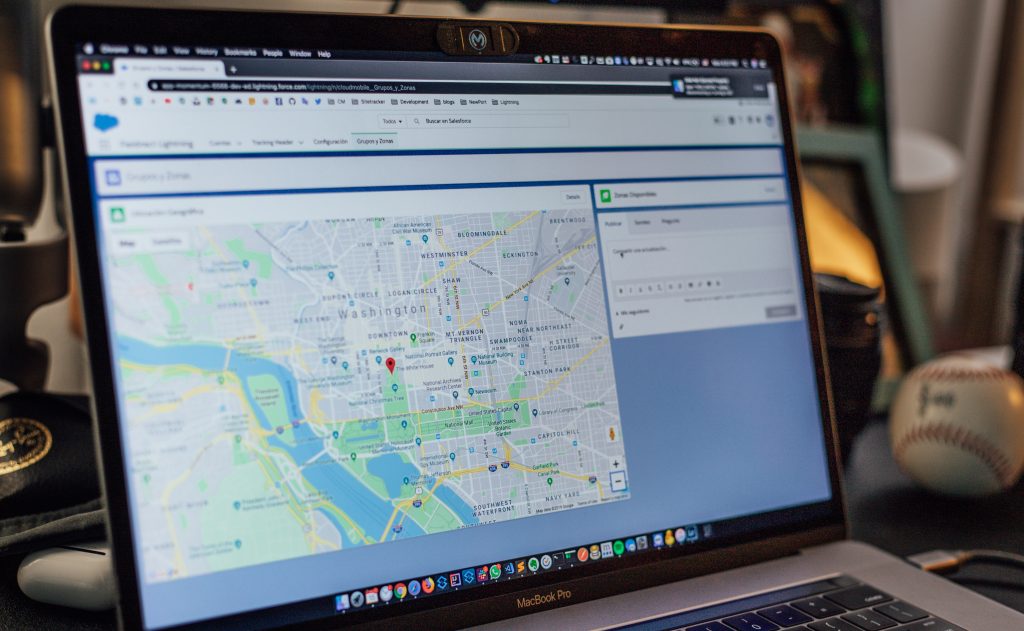 Map application on a laptop screen.